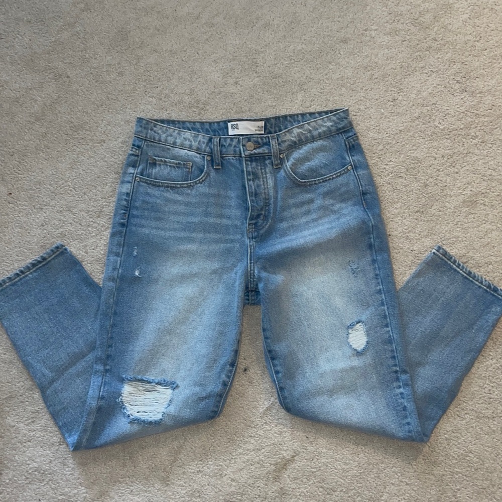 medium/light wash slight tears in knee jeans